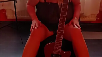 Blonde Bombshell Strums While Revealing Her Curves