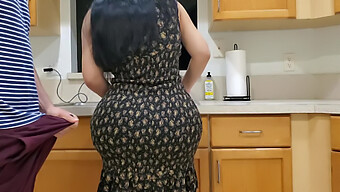 Well-Endowed Stepmom Seduces And Satisfies Stepson In The Kitchen